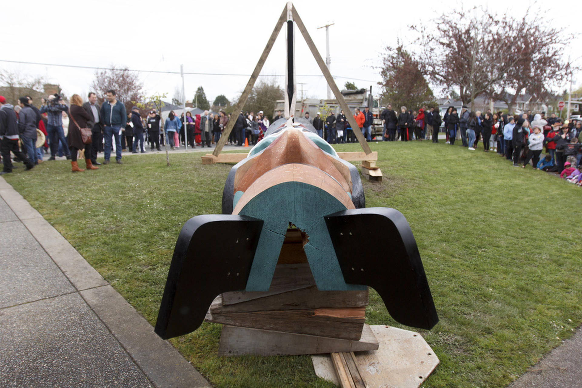 Months had been spent planning a totem pole raising at the local Friendship Centre, and the ceremony went ahead despite the passing.